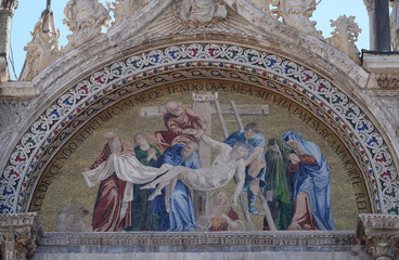 Deposition Jesus Christ From The Cross, mosaic from upper facade of the Basilica San Marco, St. Mark's Square, Venice, Italy