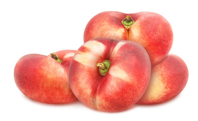 Heap of whole flat nectarines isolated on white background. As design element.