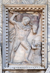 Relief depicting Hercules and the Erymanthian boar, facade detail of St. Mark's Basilica, St. Mark's Square, Venice, Italy
