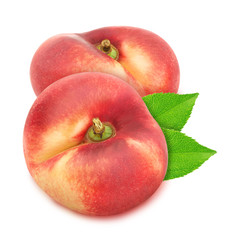 Group of ripe sweet donut nectarines with leaves isolated on white background.