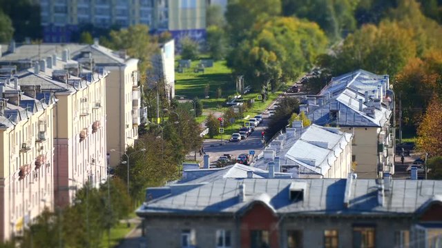 City with houses and cars, top view, timelapse.