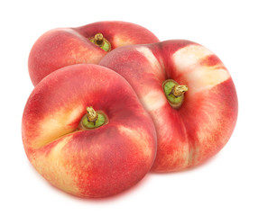 Composition with whole freshly picked flat nectarines isolated on white background. As design element.