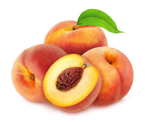Heap of whole and halved peaches with leaves isolated on white background. As design element.