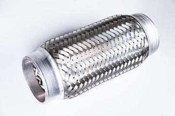 Full-contrast image flexible connection to the exhaust system of a passenger car on a gray gradient background. The concept of new car parts