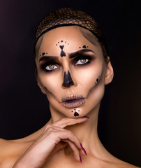 Sexy witch with Halloween skeleton make up - Image