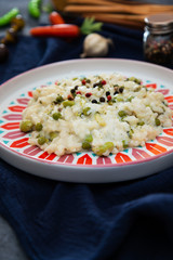 Risotto with broccoli, peas and lips