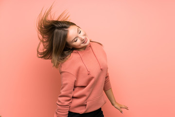Obraz premium Teenager girl dancing over isolated background
