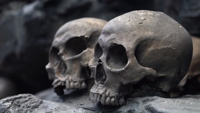 Scary Halloween Human Skulls at Tomb Entrance