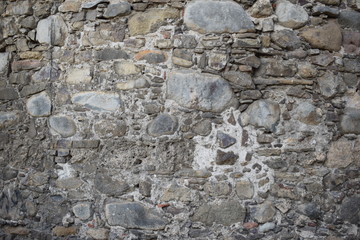Texture. The wall is ancient.Stone