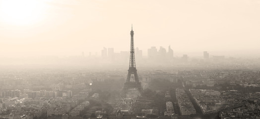 Aerial view of Paris with Eiffel tower and major business district of La Defence in background at...