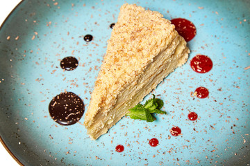 Napoleon cake on a blue plate