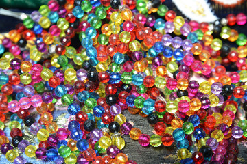 Fototapeta na wymiar colorful beads on the background