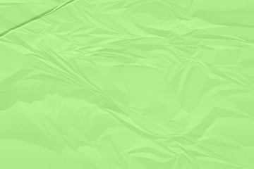 crumpled green paper background close up