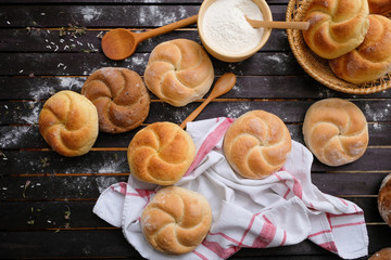 Kaiser rolls on a wooden table top view