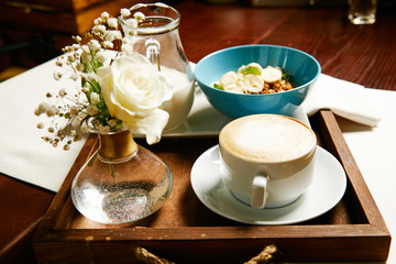 Granola and coffee breakfast