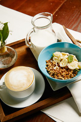 Granola and coffee breakfast