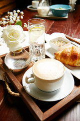 Obraz na płótnie Canvas Breakfast croissant and coffee