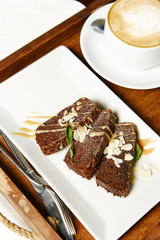 Chocolate brownie and coffee breakfast