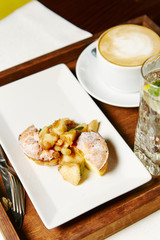 Breakfast apple strudel and coffee