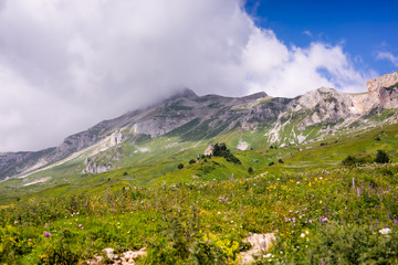 Fototapeta na wymiar Mountain peaks, gorges and slopes. Panorama mountain landscape.