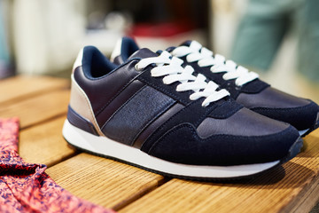 Men's shoes on a shelf in a store