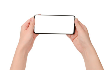 Smart phone in woman hands isolated on white background.  White screen. Copy space.