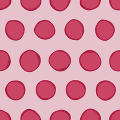 Big irregular polka dots vector seamless pattern. Trendy seamless pattern. Red circles on pink background. Vector illustration. Surface pattern design.