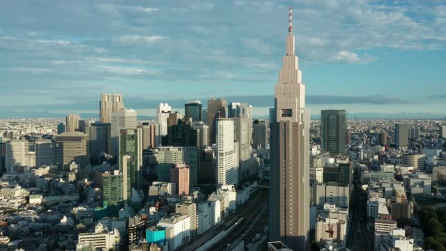 day wide orbiting counter clockwise around DTT Docomo Yoyogi building in Shinjuku Tokyo