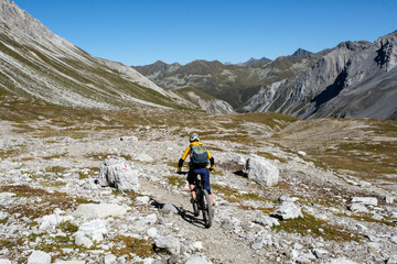 Fototapeta premium Mountain Biking around the high Valleys of Davos, Graubuenden, Switzerland, Europe