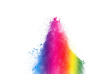 Freeze motion of colorful color powder exploding on white background.  Paint Holi.
