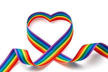 LGBT rainbow ribbon in the shape of heart. Pride tape symbol. Isolated on a white background
