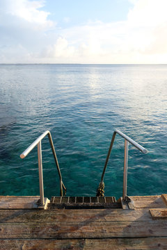 Swimming ladder with blue tropical waters