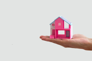 Hand with dream house;real estate concept