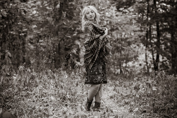 Fototapeta na wymiar Lady walk in autumn park, fashionable woman in casual style outdoors portrait