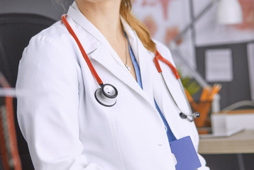 young woman doctor takes patient in office