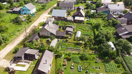 Fototapeta premium Aerial photography, view of the village from above, houses, streets, gardens