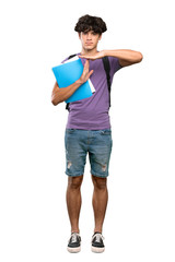 A full-length shot of a Young student man making time out gesture over isolated white background