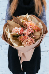 Bouquet of flowers in peach package