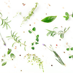 Culinary herbs and spices, overhead square shot on a white background, cooking pattern
