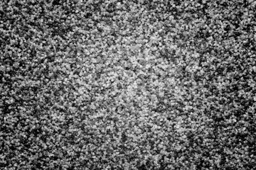 Natural colored marble chips background texture. Decorative marble plaster for indoor and outdoor use. Coarse-grained stone. quartz sand