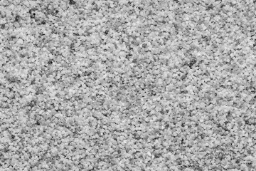 Natural colored marble chips background texture. Decorative marble plaster for indoor and outdoor use. Coarse-grained stone. quartz sand