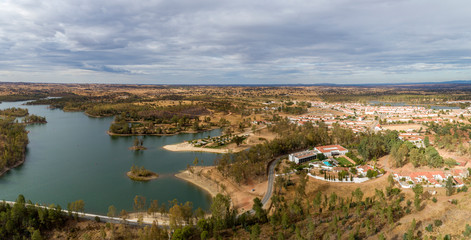 Aerial view of Mina de Sao Domingos, Tapada Grande River Beach lagoon, famous tourist destination, Alentejo, Portugal.