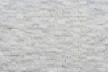 White modern decorative natural stone for inside. Panel wall small marble brick background texture, decorative pattern quartz stone mosaic. interior decoration of the room