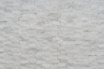 White modern decorative natural stone for inside. Panel wall small marble brick background texture, decorative pattern quartz stone mosaic. interior decoration of the room