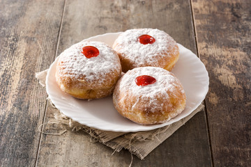Hanukkah sufganiyot. Traditional Jewish donuts for Hanukkah.