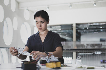 Female working on robotics