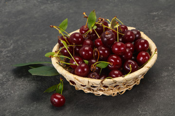 Sweet ripe cherry with leaves