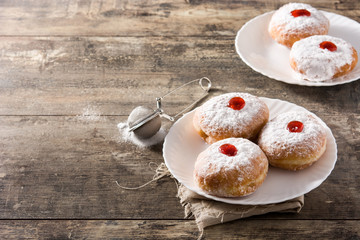 Hanukkah sufganiyot. Traditional Jewish donuts for Hanukkah.Copy space