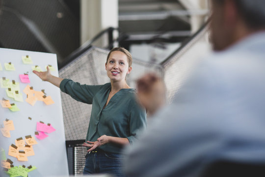 Female executive holding a brainstorm meeting - Powered by Adobe