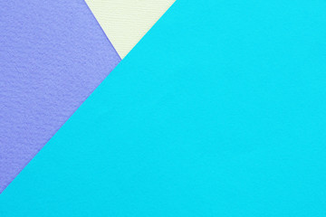 Abstract background and texture. Three sheets of multi-colored lilac, turquoise and light yellow paper...